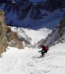 Dustin enjoys good snow in the middle of the couloir