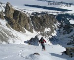Skiing off the summit of the Dike Pinnacle on the Middle Teton