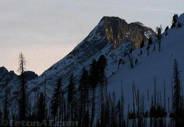 sun-on-west-face-of-mount-moran