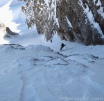 wray-landon-skis-below-the-crux-of-the-sickle-couloir-on-mount-moran