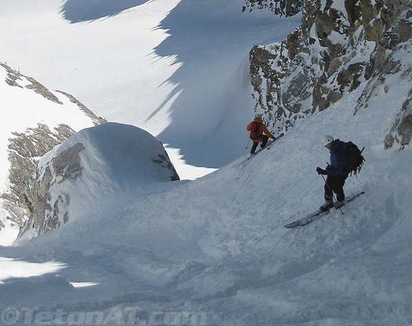 wray-watches-as-steve-romeo-skis-the-crux-of-the-sickle-couloir-on-mount-moran