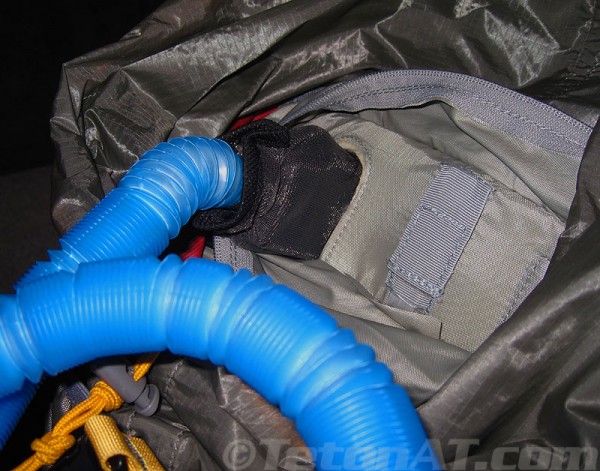 pull-out-avalung-hose-from-inside-pack-and-twist
