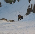 reed-climbs-the-crux-exit-to-the-southwest-couloir-on-mount-moran